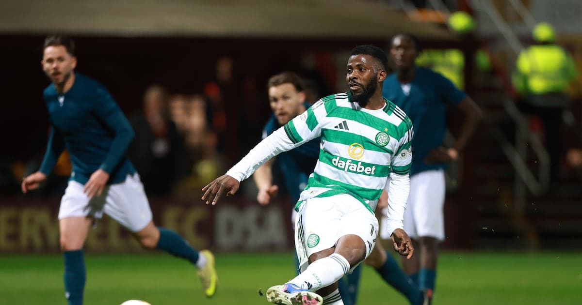 Celtic player dribbling the ball during match Celtic player dribbling the ball during match