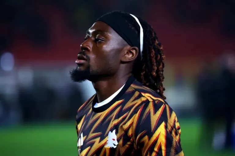 Player in patterned jersey during match warm-up Player in patterned jersey during match warm-up