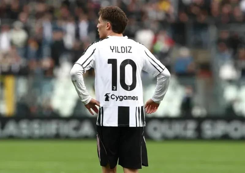 Player Yildiz wearing jersey number 10 on field Player Yildiz wearing jersey number 10 on field