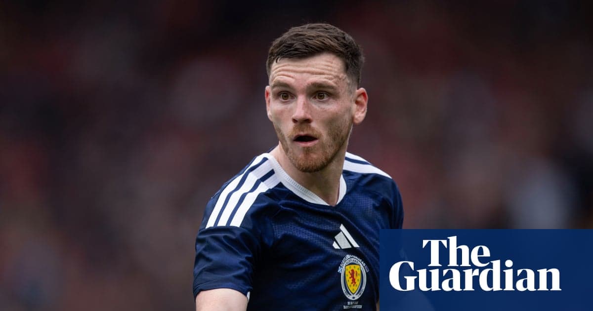 Scottish player in action during a football match Scottish player in action during a football match