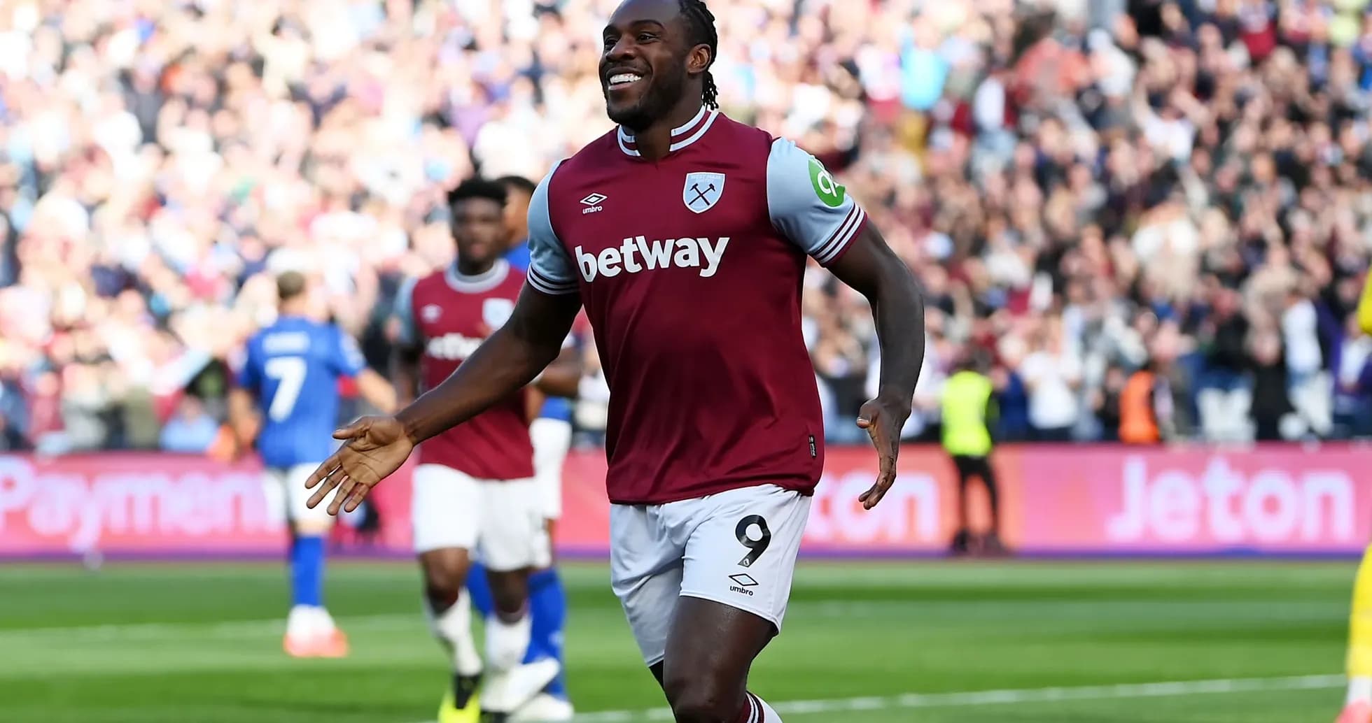 Player celebrating a goal during a match Player celebrating a goal during a match