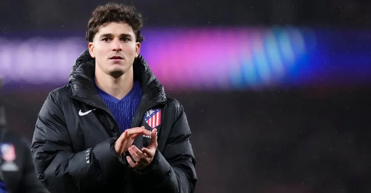 Player applauding in Atletico Madrid jacket Player applauding in Atletico Madrid jacket