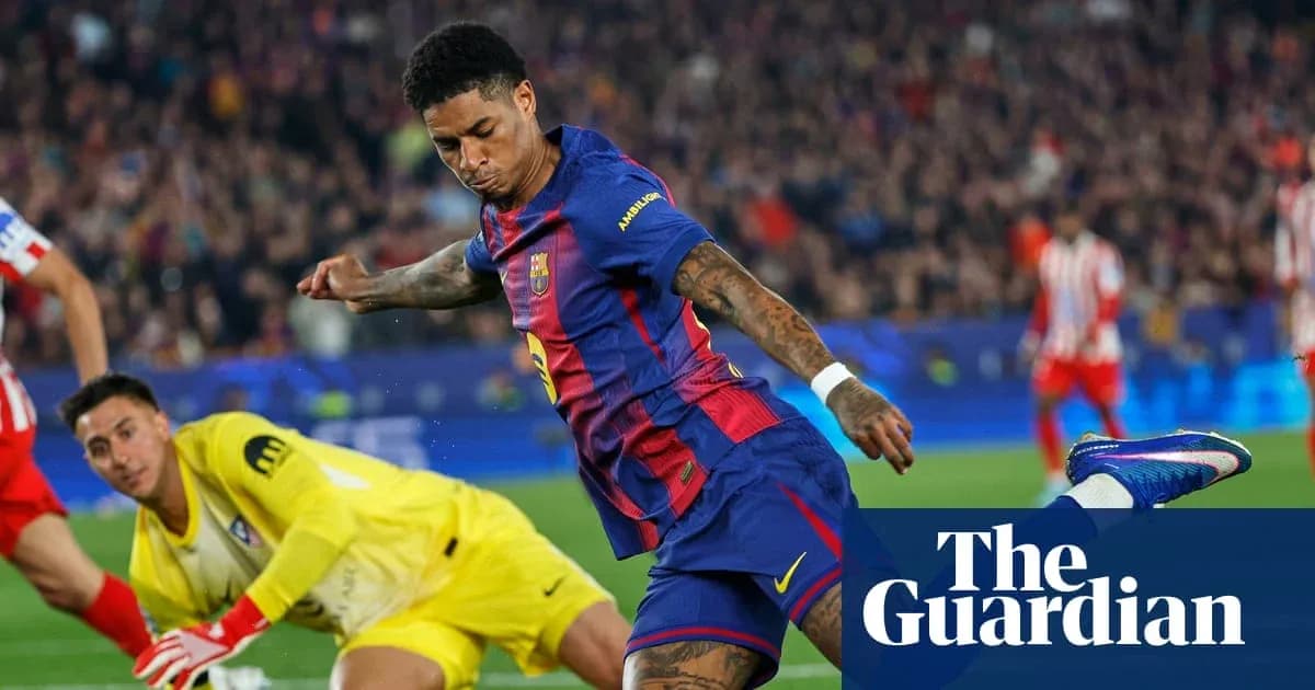 Barcelona player attempting to score against goalkeeper Barcelona player attempting to score against goalkeeper
