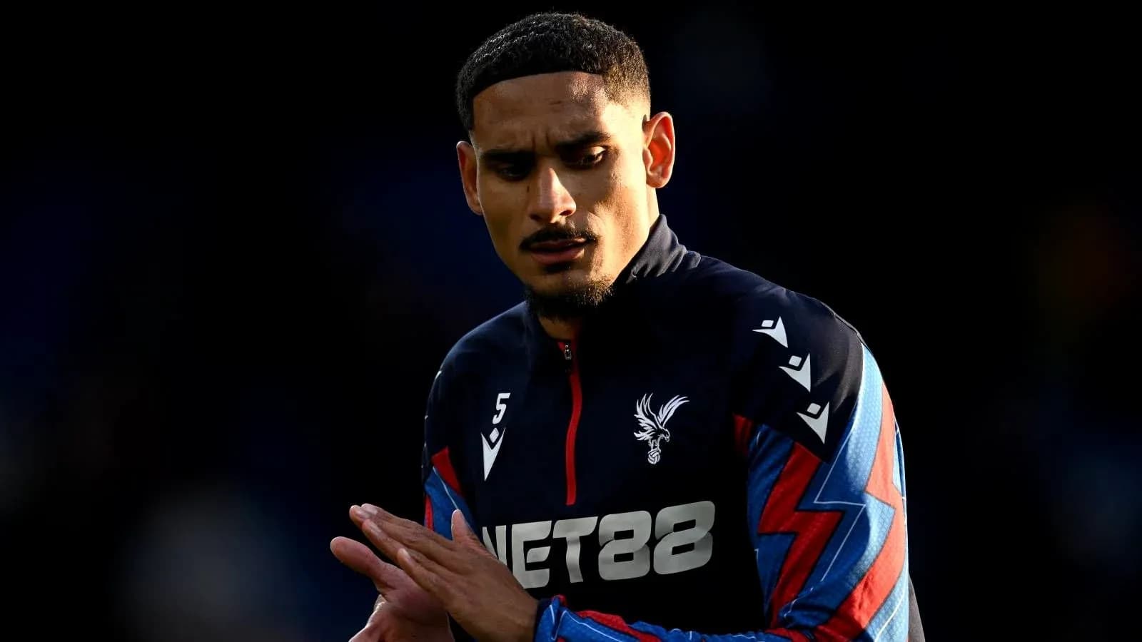 Player in Crystal Palace kit during warm-up Player in Crystal Palace kit during warm-up