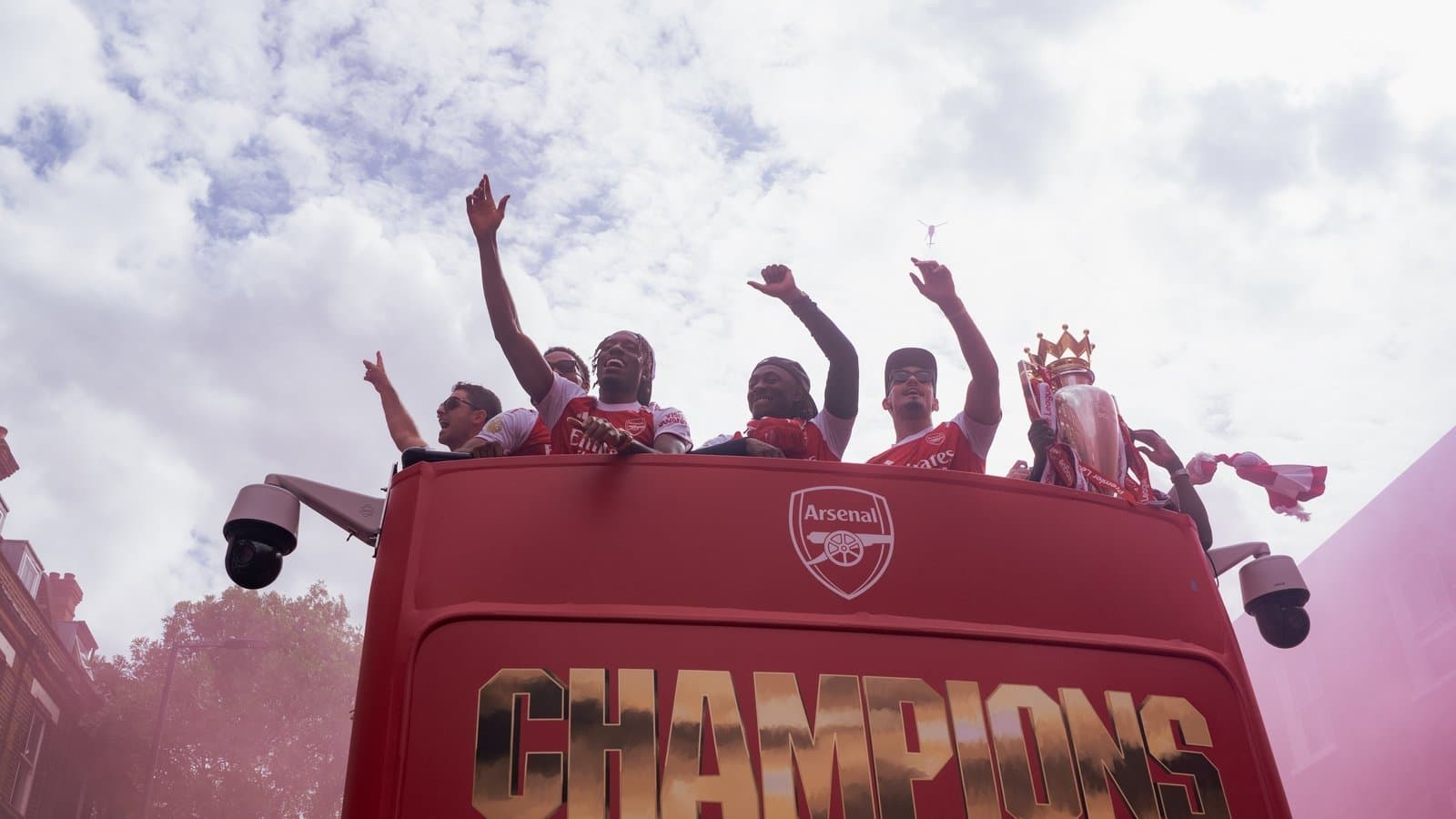 Arsenal players celebrating on open-top bus parade Arsenal players celebrating on open-top bus parade