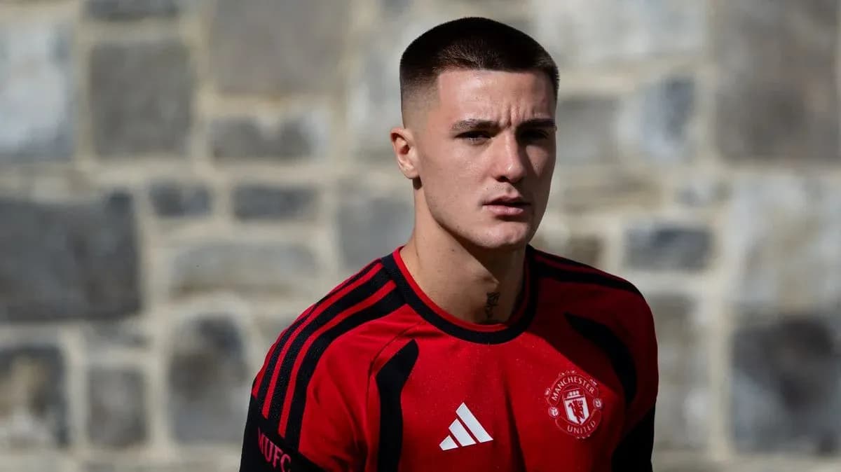 Player in Manchester United training kit outdoors Player in Manchester United training kit outdoors