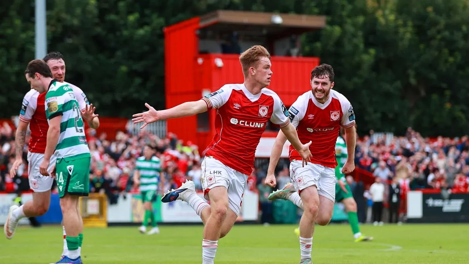 Player celebrating a goal during a match Player celebrating a goal during a match