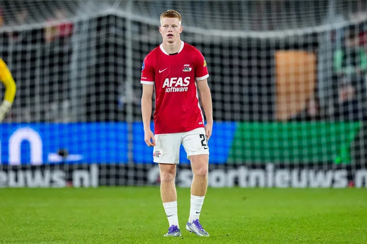 Player in red jersey standing on the field Player in red jersey standing on the field