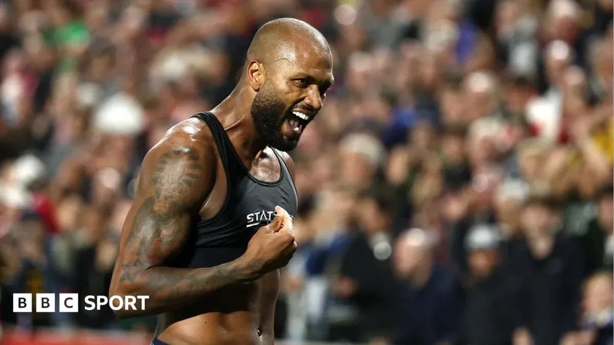 Athlete celebrating passionately during a sporting event Athlete celebrating passionately during a sporting event