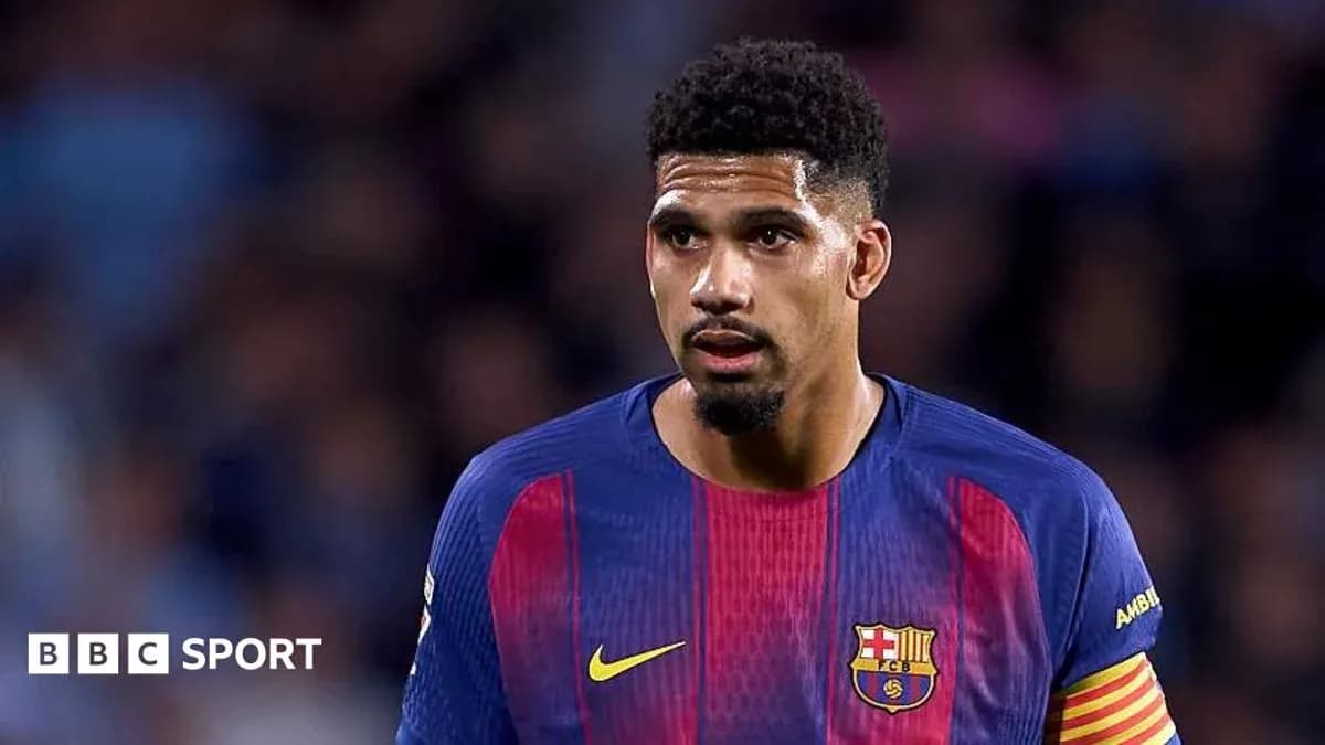 Barcelona player in match uniform on the field Barcelona player in match uniform on the field