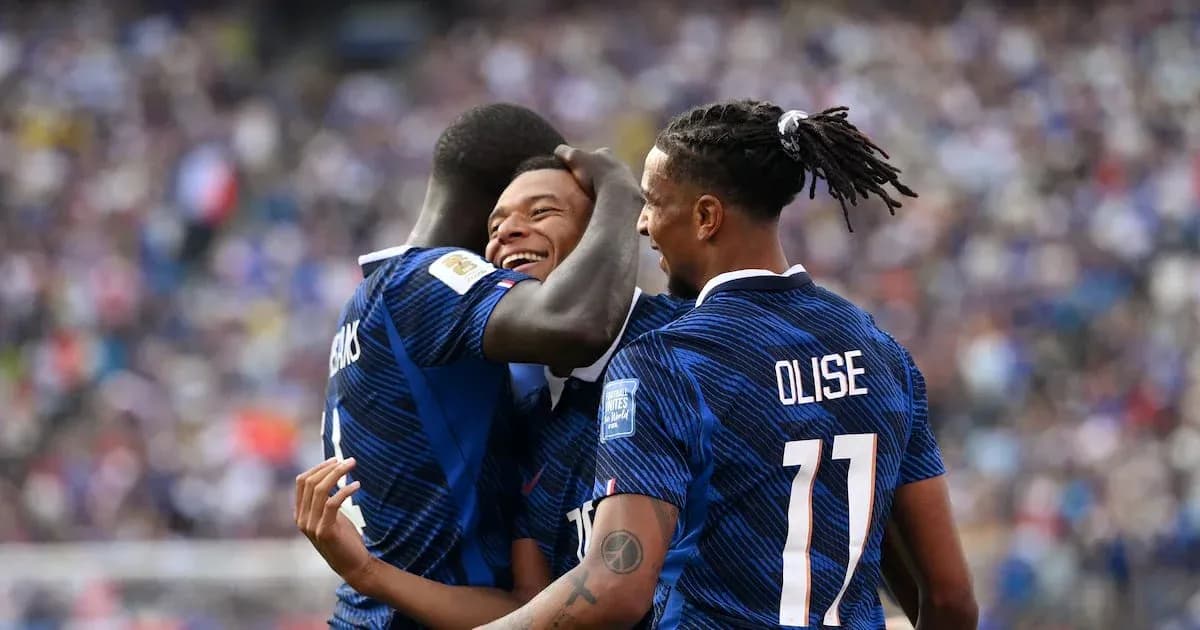 Players celebrating a goal during a match Players celebrating a goal during a match