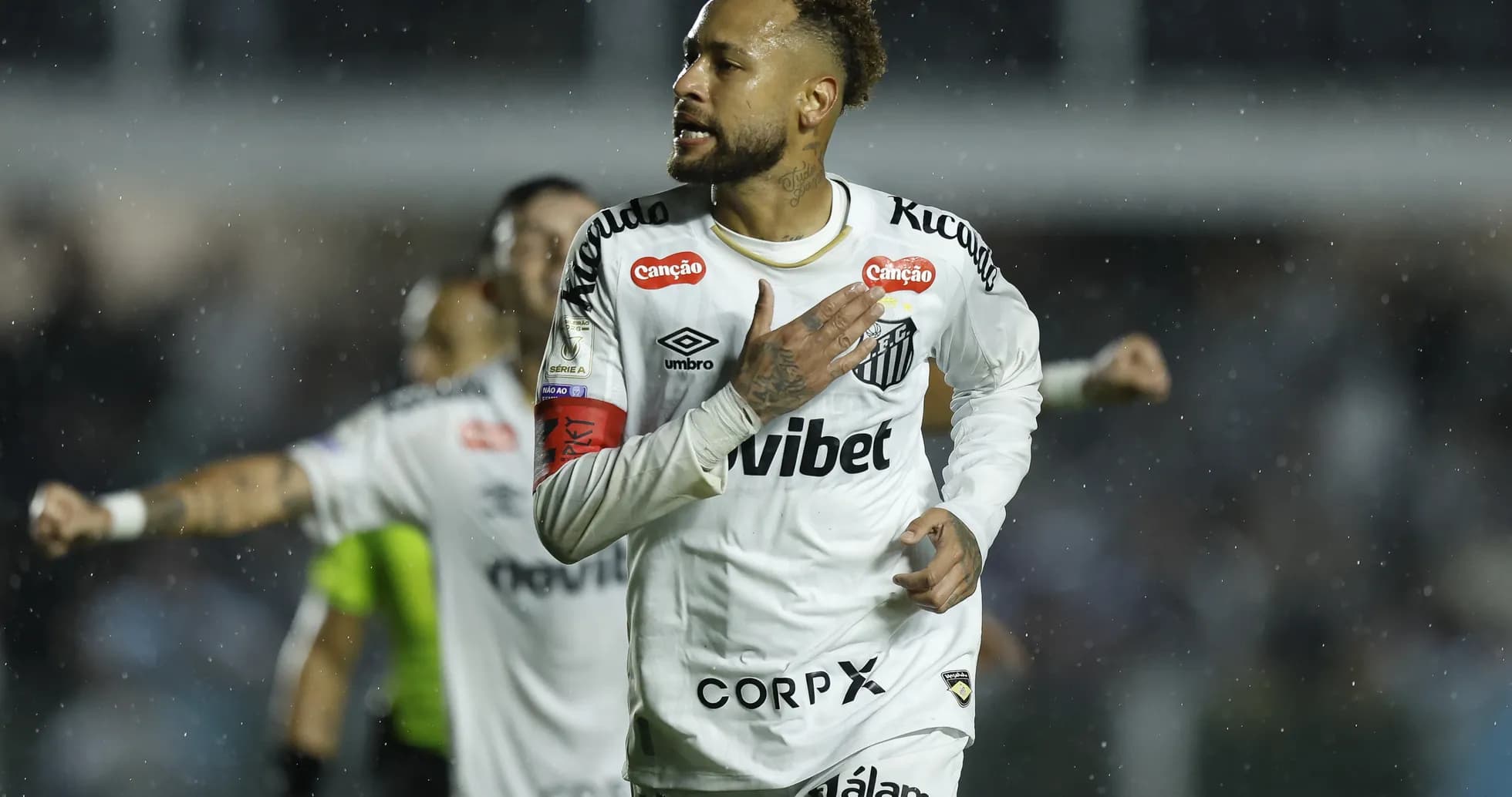 Neymar celebrating a goal for Santos in rain Neymar celebrating a goal for Santos in rain