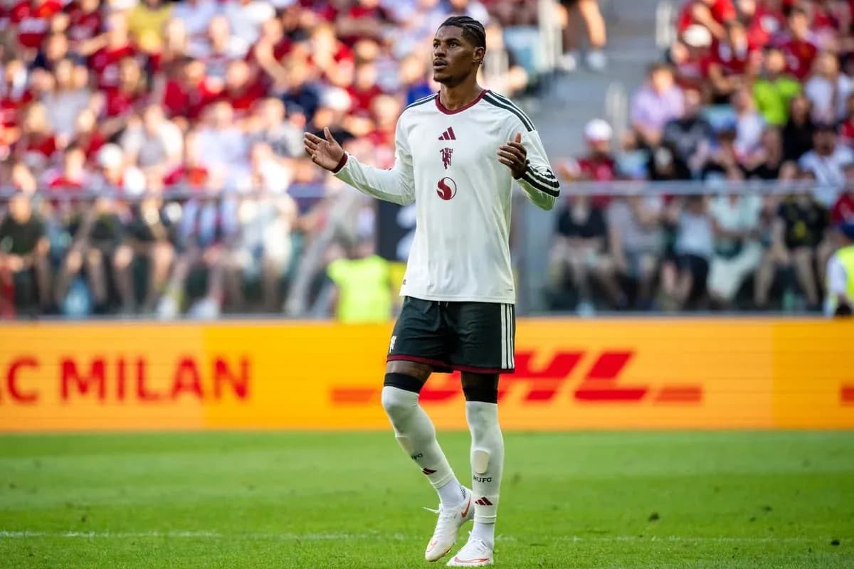 Player gesturing during match with crowd in background Player gesturing during match with crowd in background