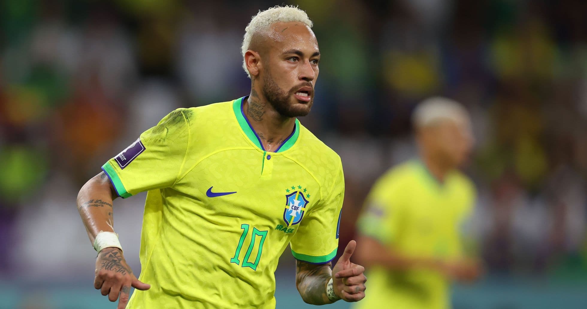 Neymar running in Brazil's yellow football kit Neymar running in Brazil's yellow football kit