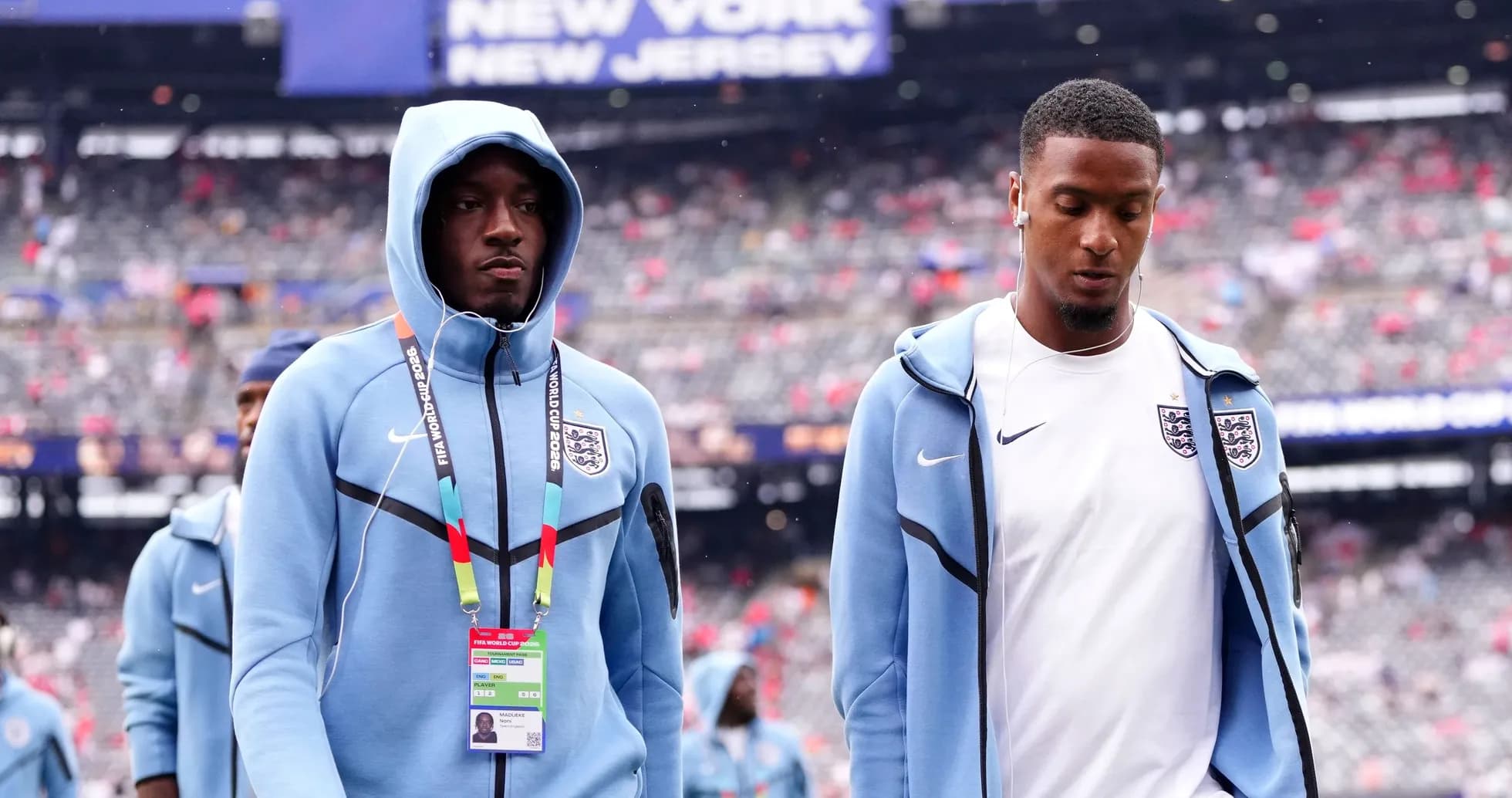 Two England players walking onto the field before match Two England players walking onto the field before match