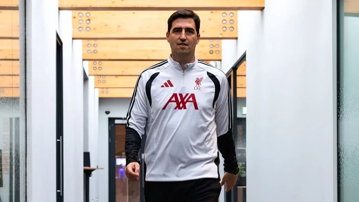 Goalkeeper walking through training facility hallway Goalkeeper walking through training facility hallway