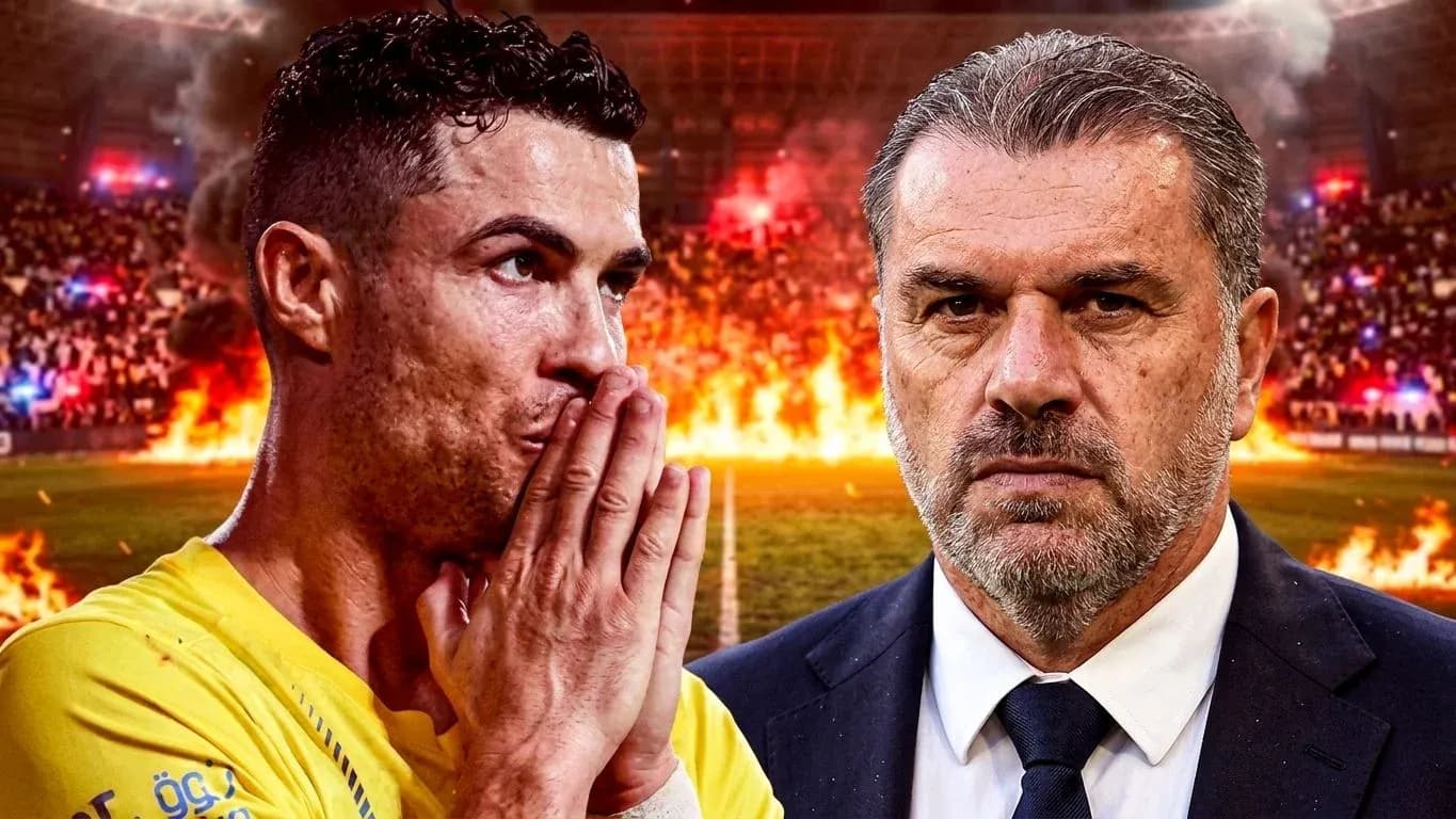 Cristiano Ronaldo and coach facing intense stadium backdrop Cristiano Ronaldo and coach facing intense stadium backdrop