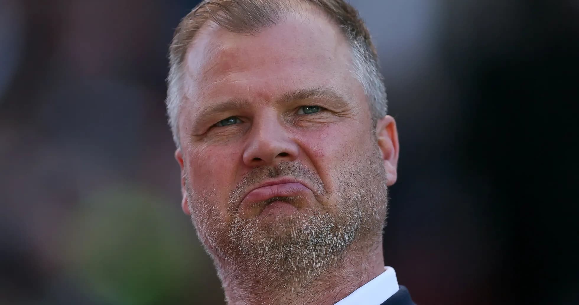 Man with serious expression during a match Man with serious expression during a match