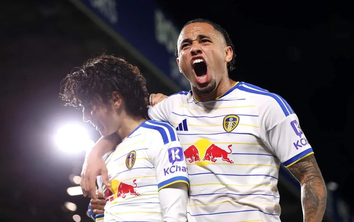 Leeds United players celebrating a goal together Leeds United players celebrating a goal together