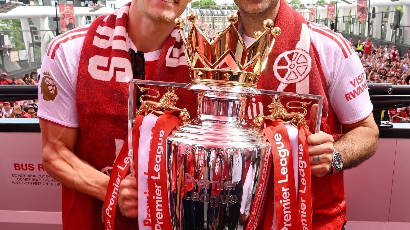 Players celebrating with Premier League trophy on parade Players celebrating with Premier League trophy on parade