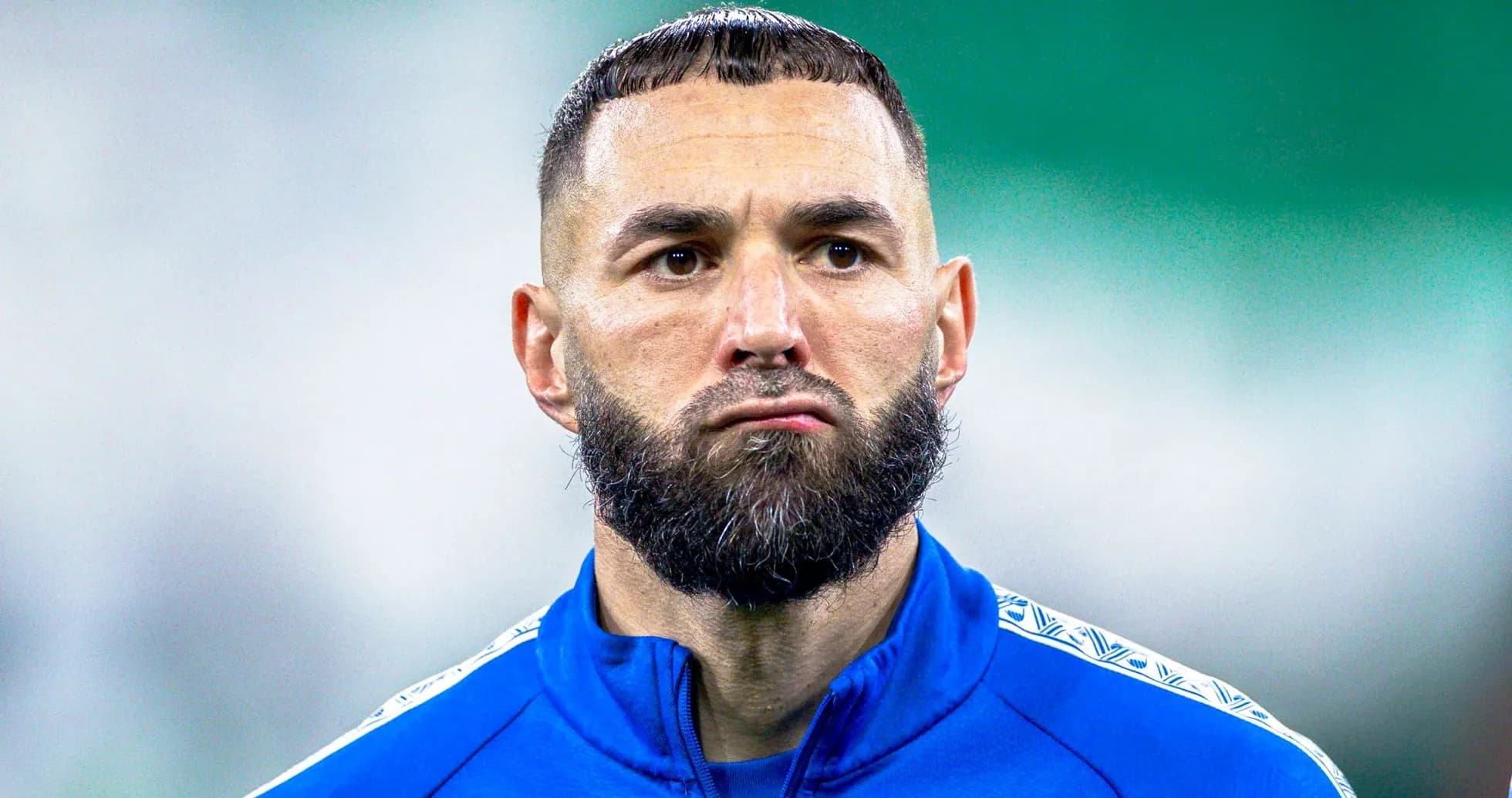 Football player in blue jersey with beard Football player in blue jersey with beard