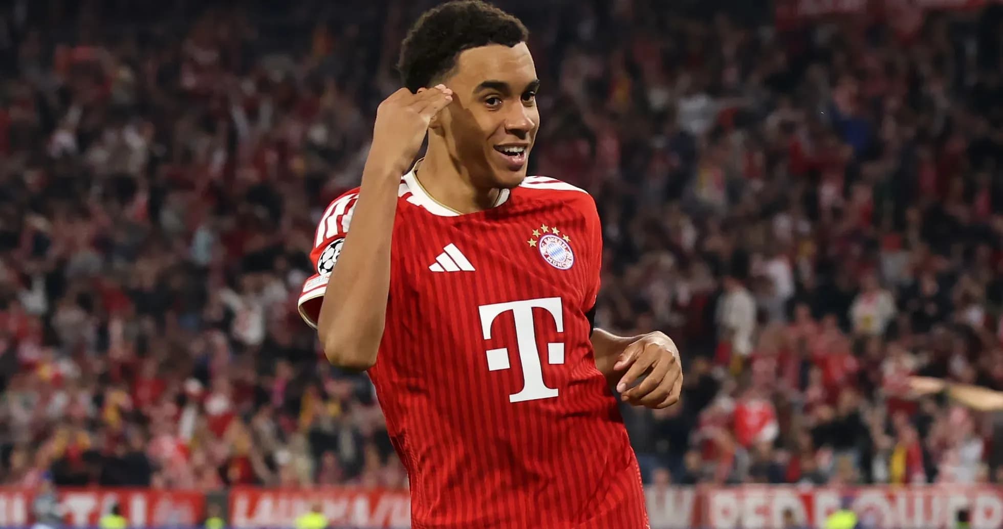 Player celebrating a goal during a match Player celebrating a goal during a match