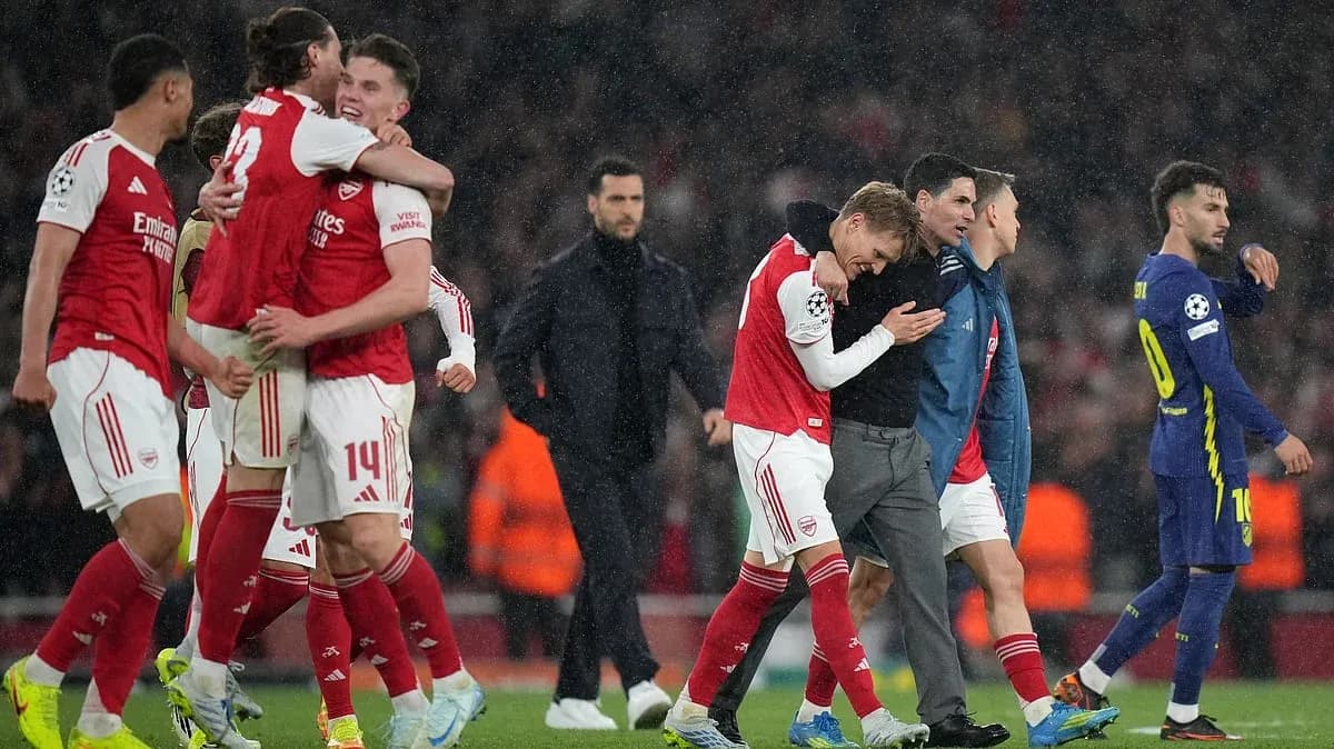 Arsenal players celebrating after UEFA Champions League match Arsenal players celebrating after UEFA Champions League match