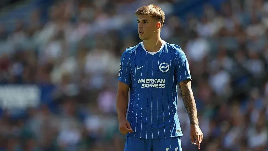 Player in Brighton kit during match on field Player in Brighton kit during match on field