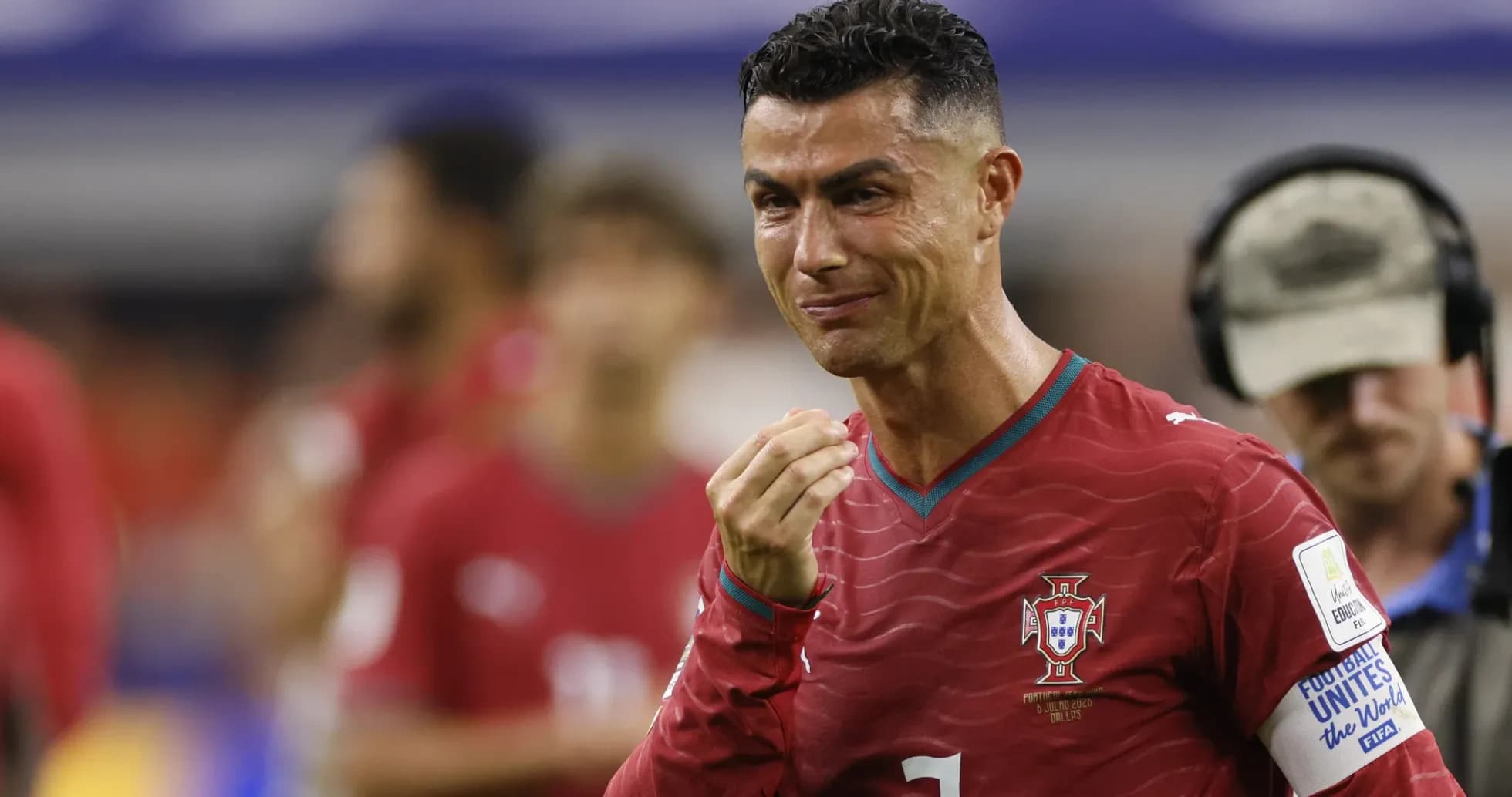 Cristiano Ronaldo smiling during a match for Portugal Cristiano Ronaldo smiling during a match for Portugal