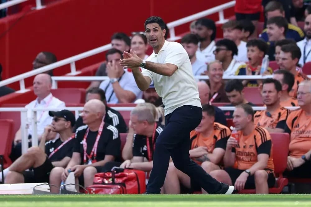 Coach gesturing from the sidelines during match Coach gesturing from the sidelines during match