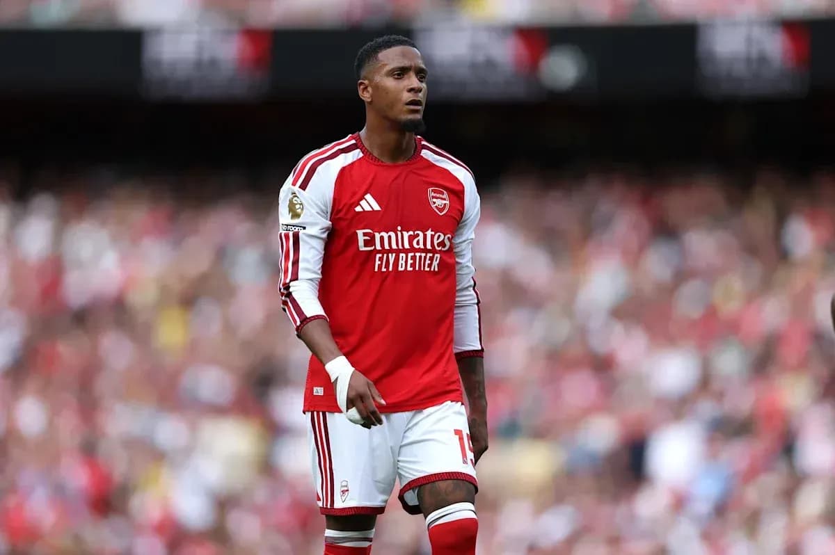 Arsenal player standing on the pitch during match Arsenal player standing on the pitch during match