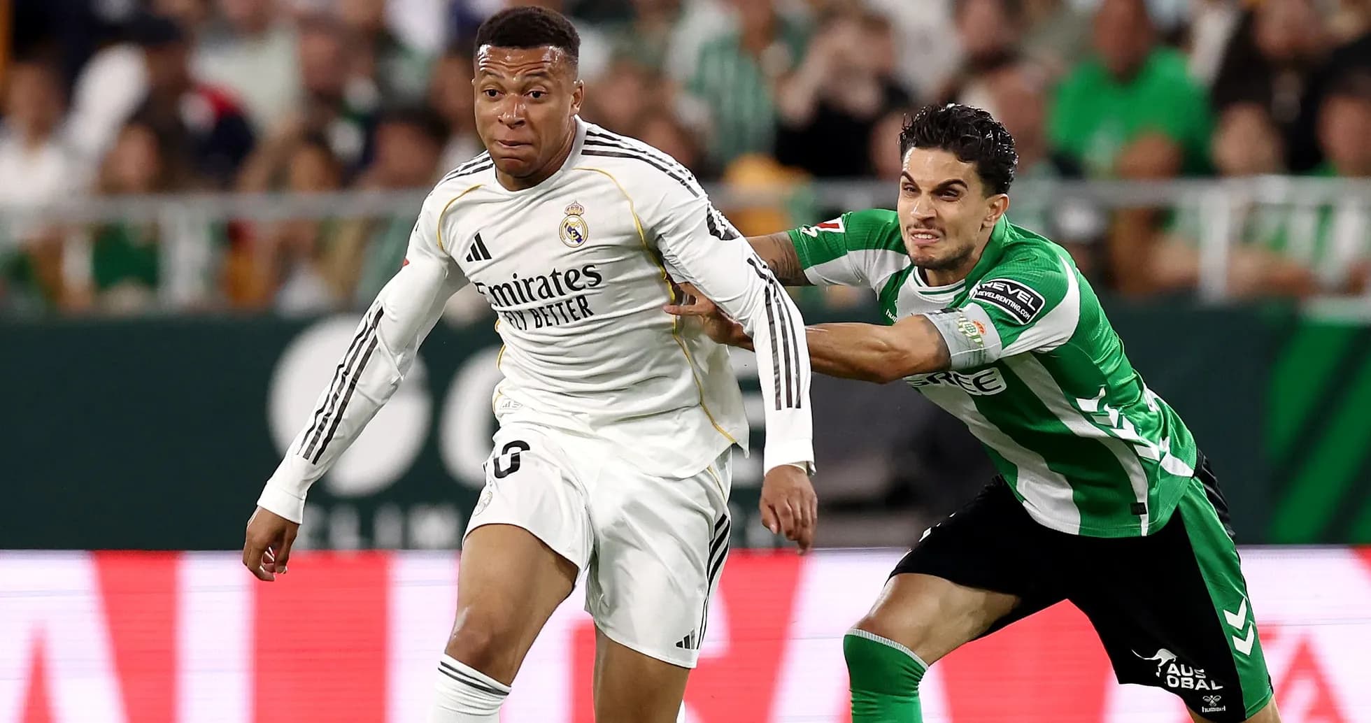 Player in white being challenged by opponent in green Player in white being challenged by opponent in green