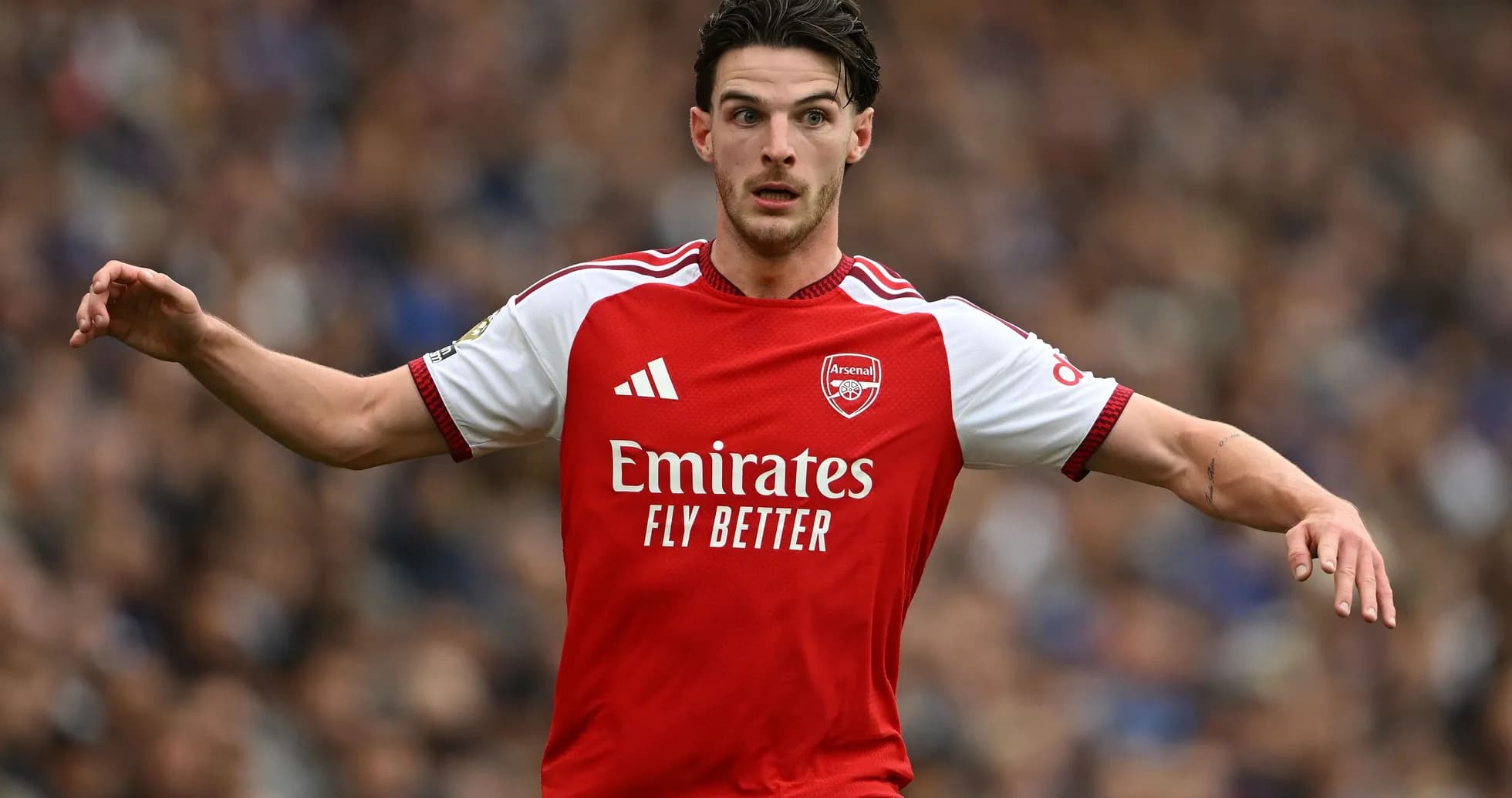 Player in Arsenal kit gesturing during match Player in Arsenal kit gesturing during match