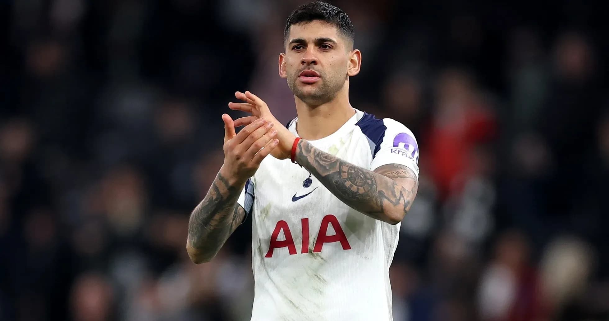 Player applauding fans after match wearing Spurs kit Player applauding fans after match wearing Spurs kit