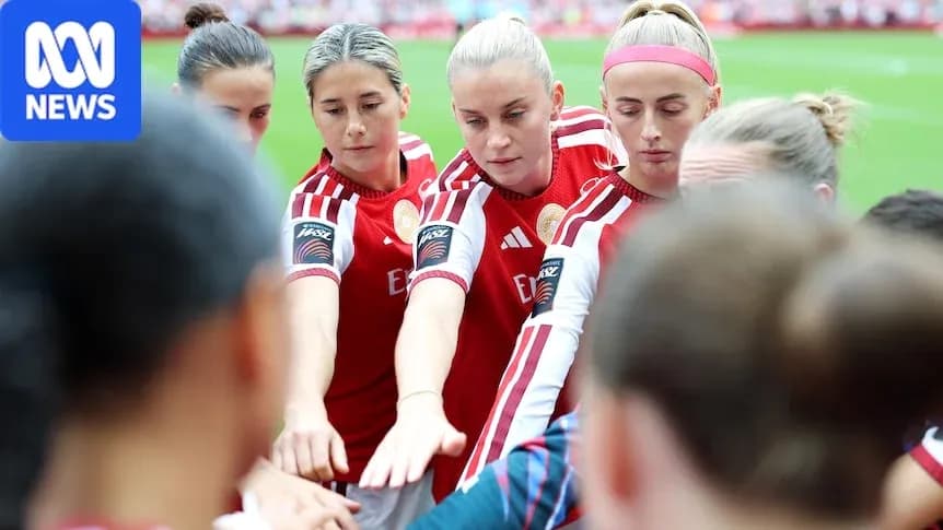Female players in huddle before a match Female players in huddle before a match