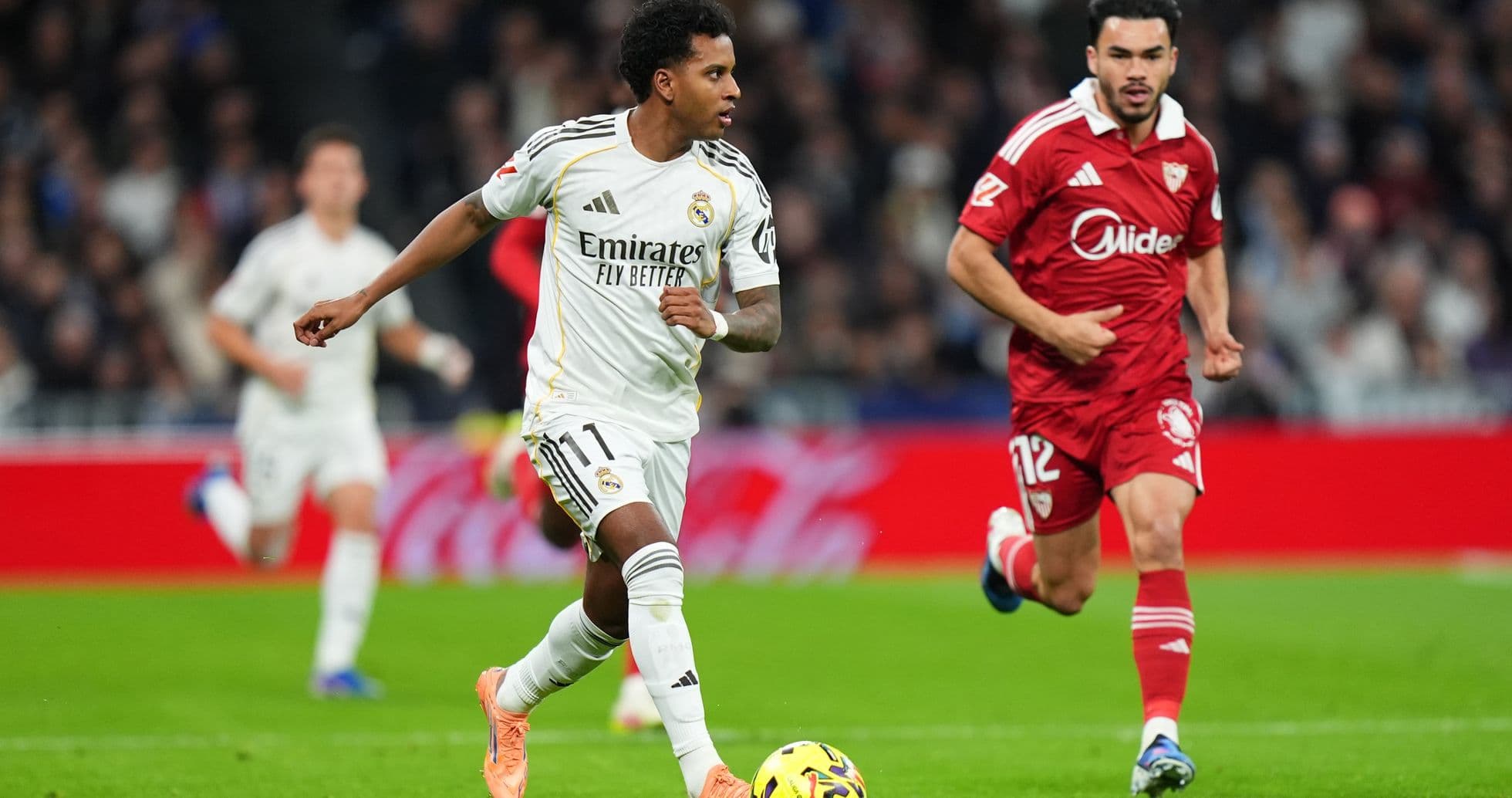 Player dribbling during Sevilla vs Real Madrid match Player dribbling during Sevilla vs Real Madrid match