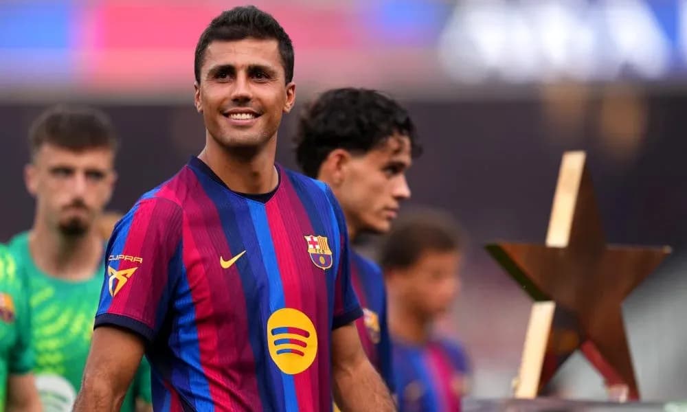 Player smiling with trophy at Barcelona event Player smiling with trophy at Barcelona event