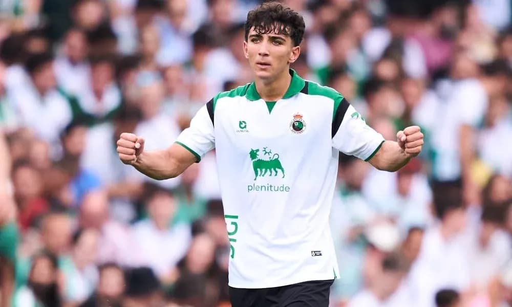 Player celebrating in white jersey during match Player celebrating in white jersey during match