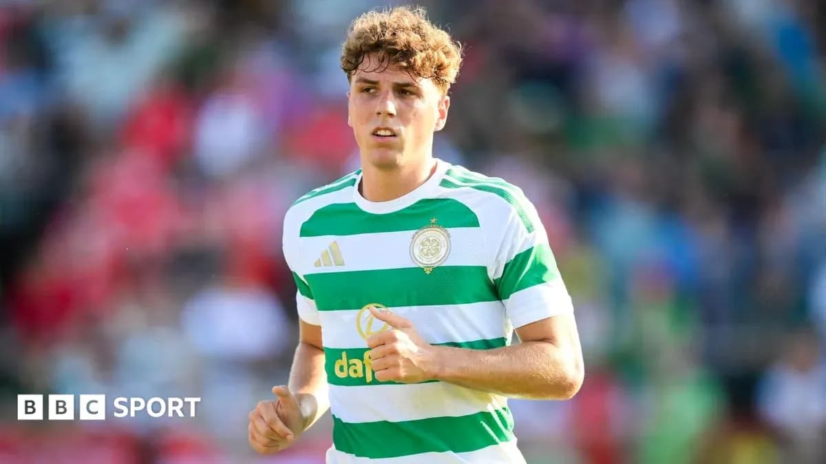 Player in Celtic FC kit running on the pitch Player in Celtic FC kit running on the pitch