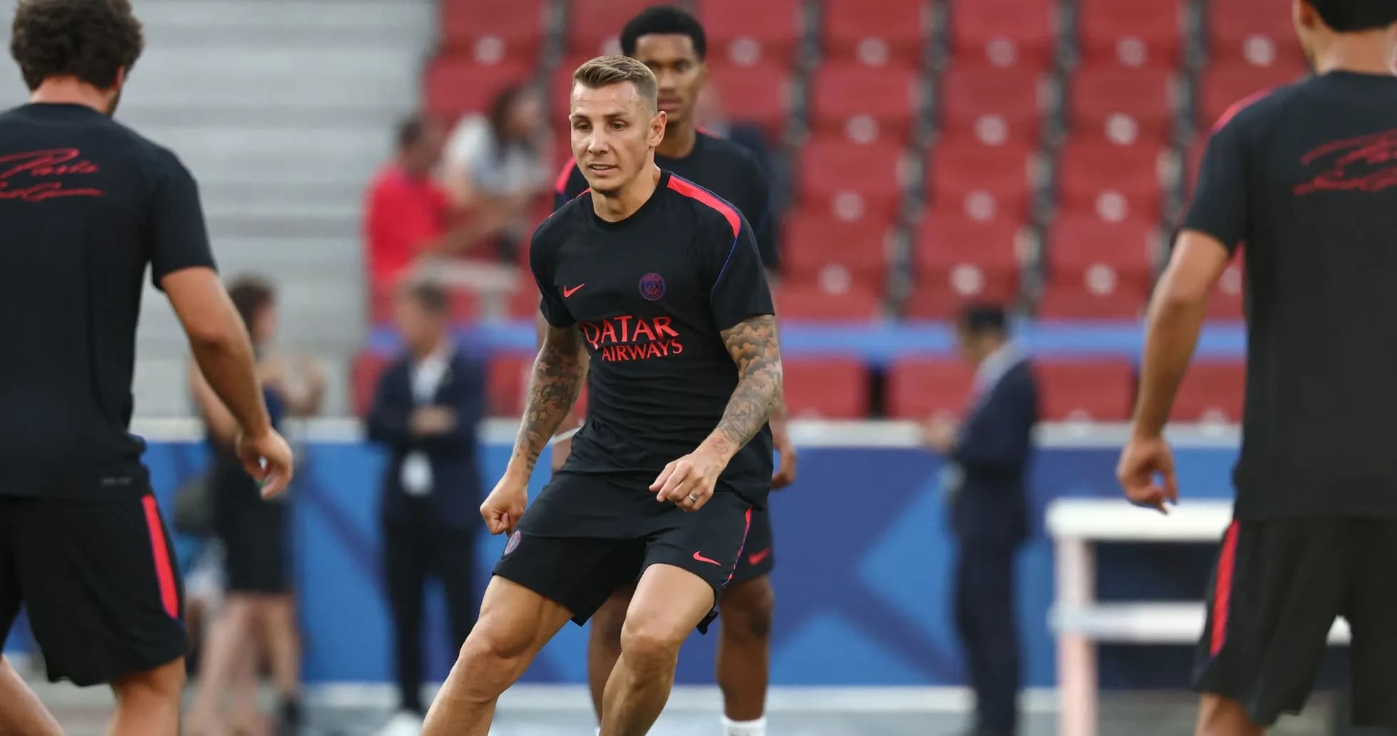Player training on pitch before match warm-up Player training on pitch before match warm-up