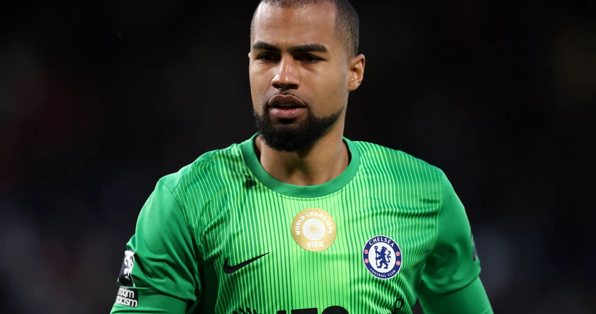 Goalkeeper in green kit during match Goalkeeper in green kit during match