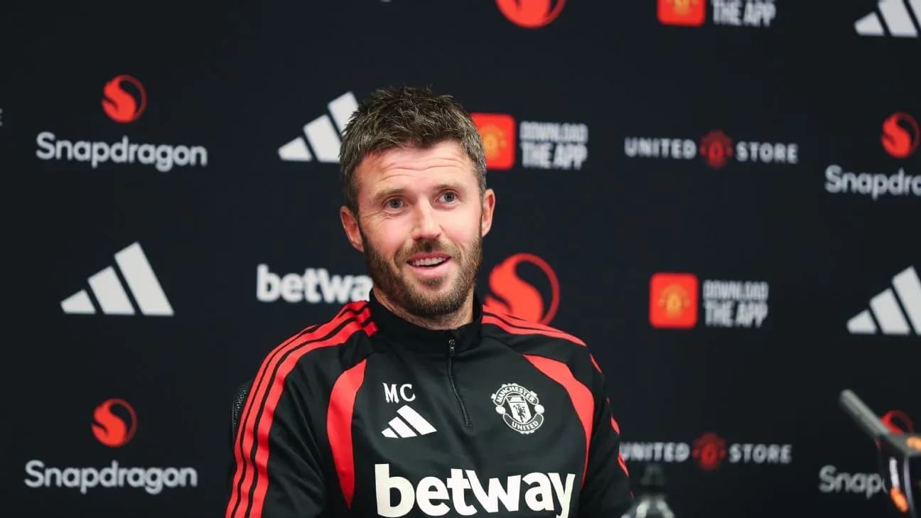 Manager speaking at press conference with Manchester United backdrop Manager speaking at press conference with Manchester United backdrop