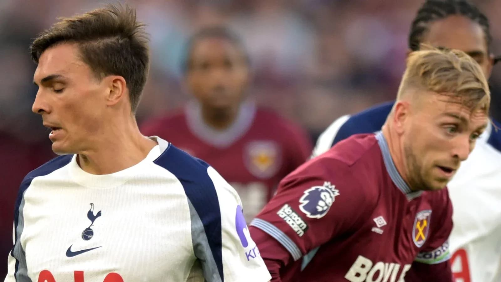Two players from Tottenham and West Ham in action Two players from Tottenham and West Ham in action