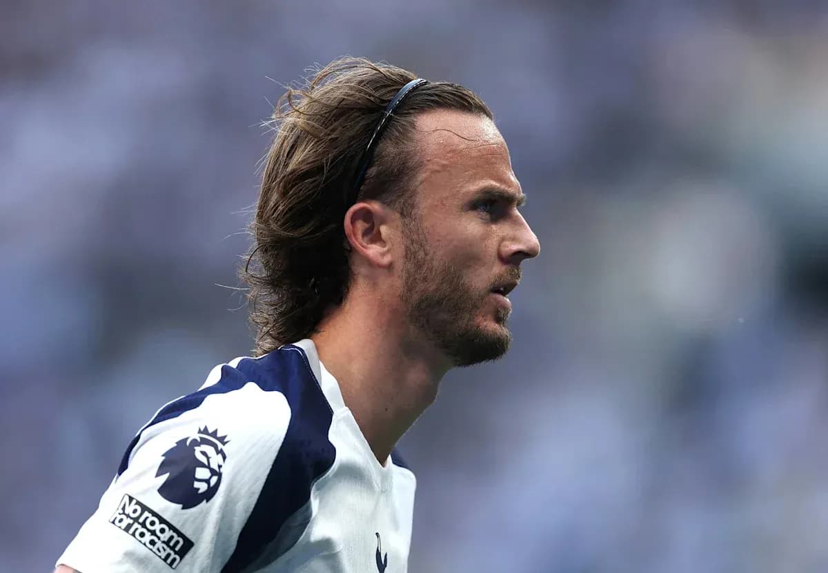 Player in Tottenham jersey during match action Player in Tottenham jersey during match action