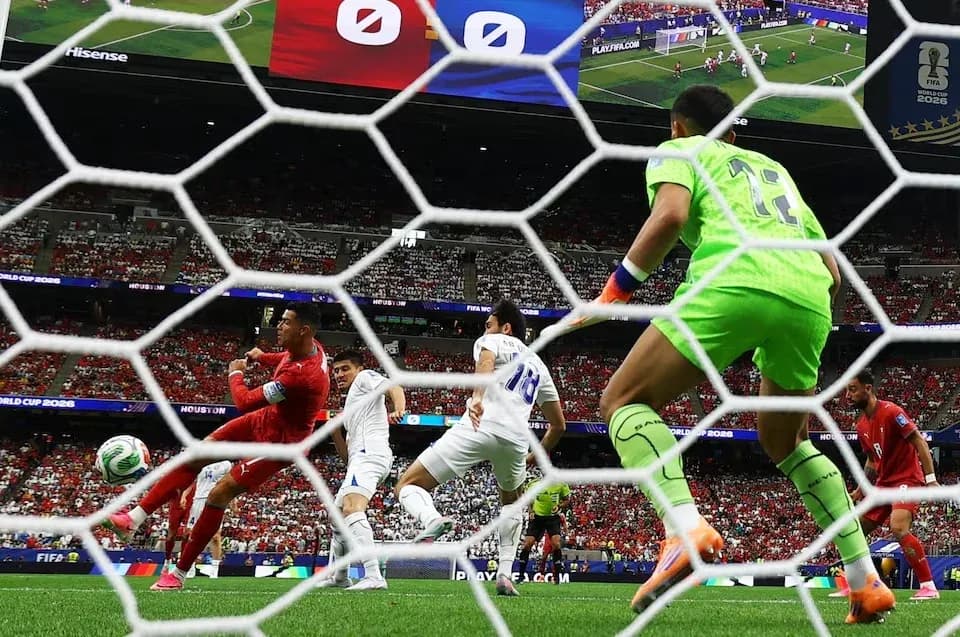 Goalkeeper attempting save during World Cup match Goalkeeper attempting save during World Cup match