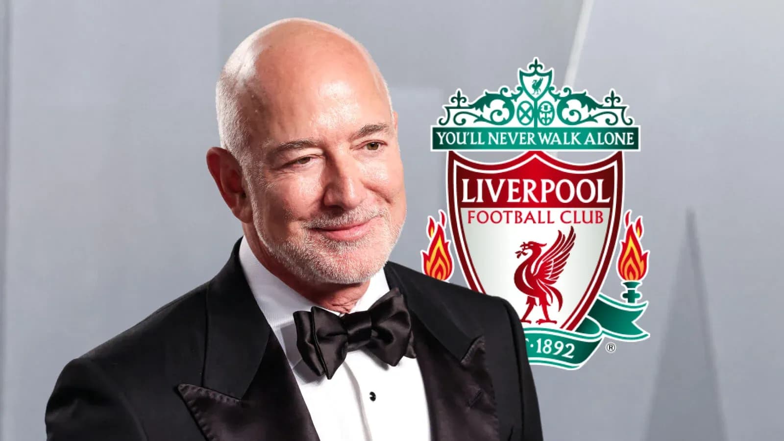 Person in tuxedo with Liverpool FC logo background Person in tuxedo with Liverpool FC logo background