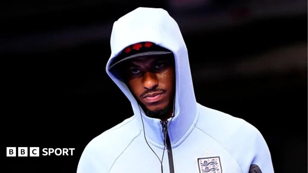 Player wearing a hoodie before a match Player wearing a hoodie before a match
