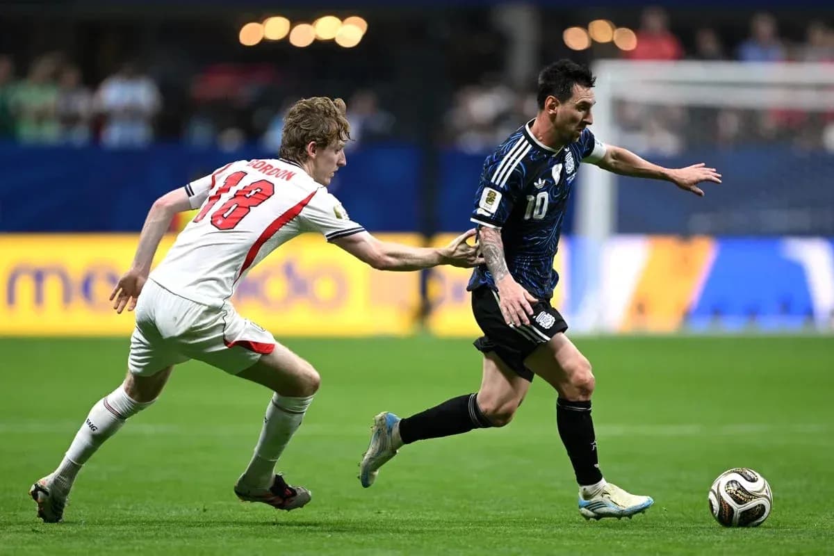 Player evading tackle while dribbling ball Player evading tackle while dribbling ball