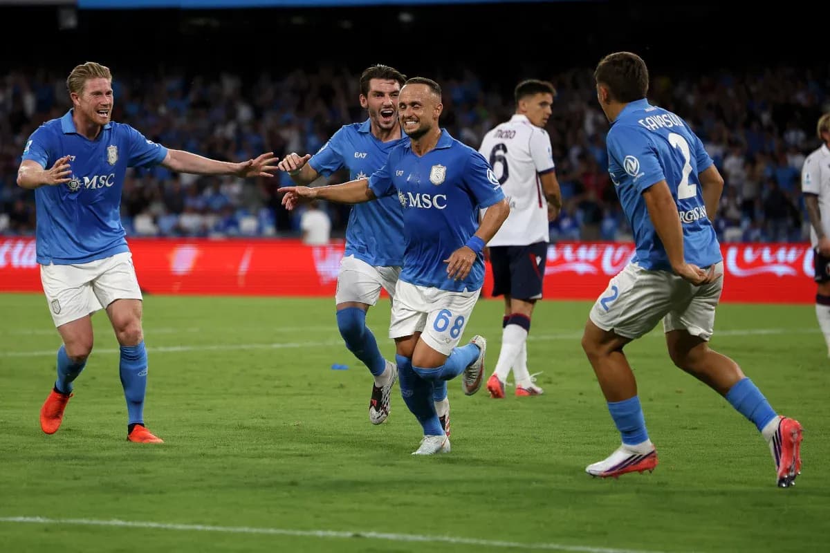 Napoli players celebrating a goal in match Napoli players celebrating a goal in match