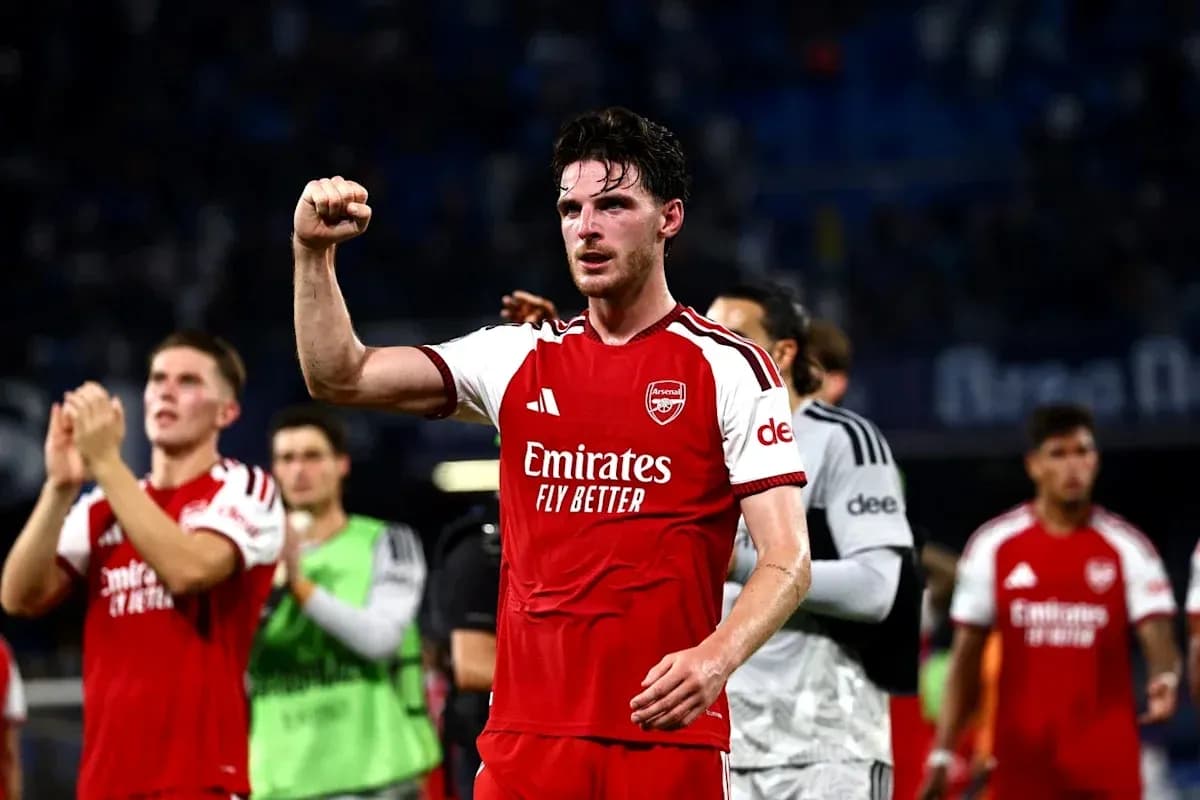 Arsenal player celebrating after a match victory Arsenal player celebrating after a match victory